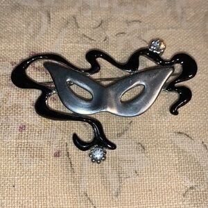 Masquerade brooch